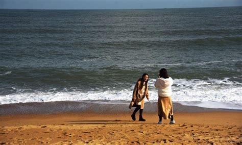 ¡Sumérgete en la historia y belleza de Wanpingkou Scenic Area! Playa espectacular y acantilados impresionantes